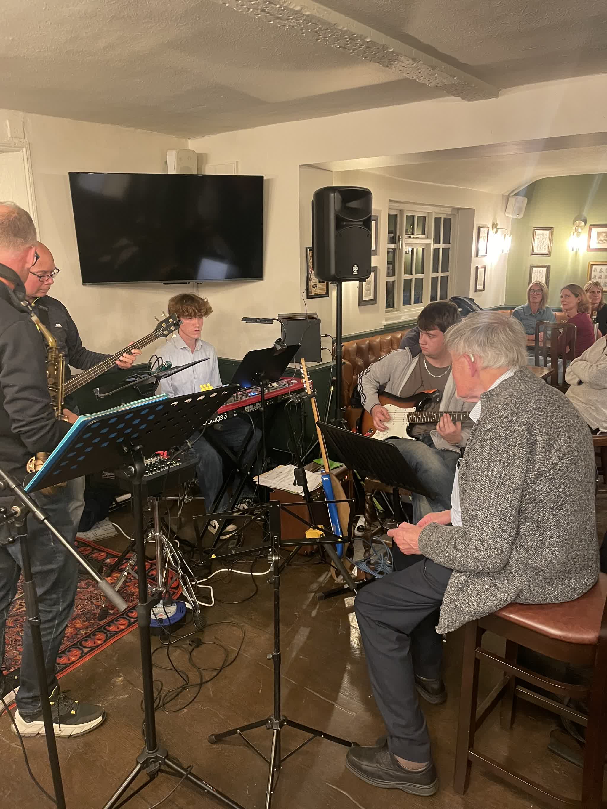 Local jazz teaching legend Bob Power conducting the inaugural 